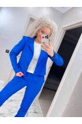 Жіночий костюм з короткий піджаком 